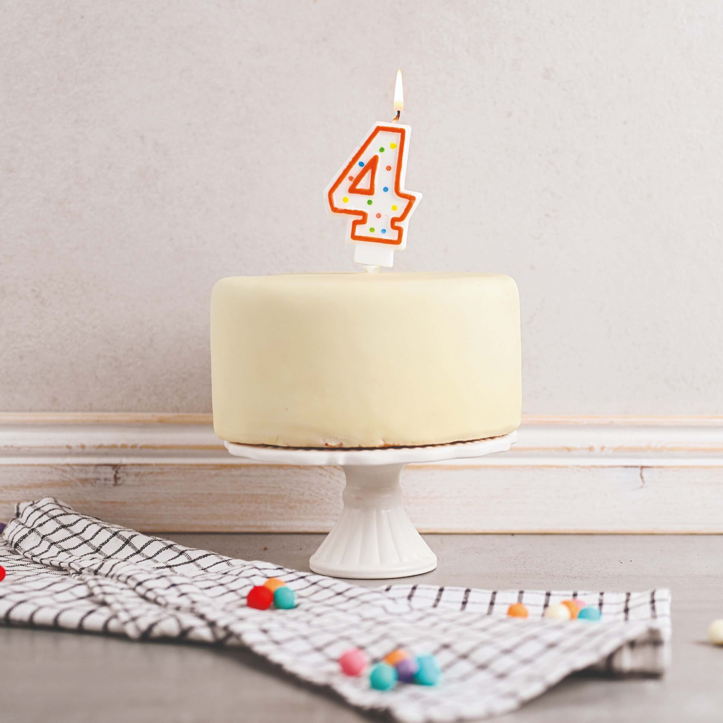 Number candle 4, e.g. for a birthday