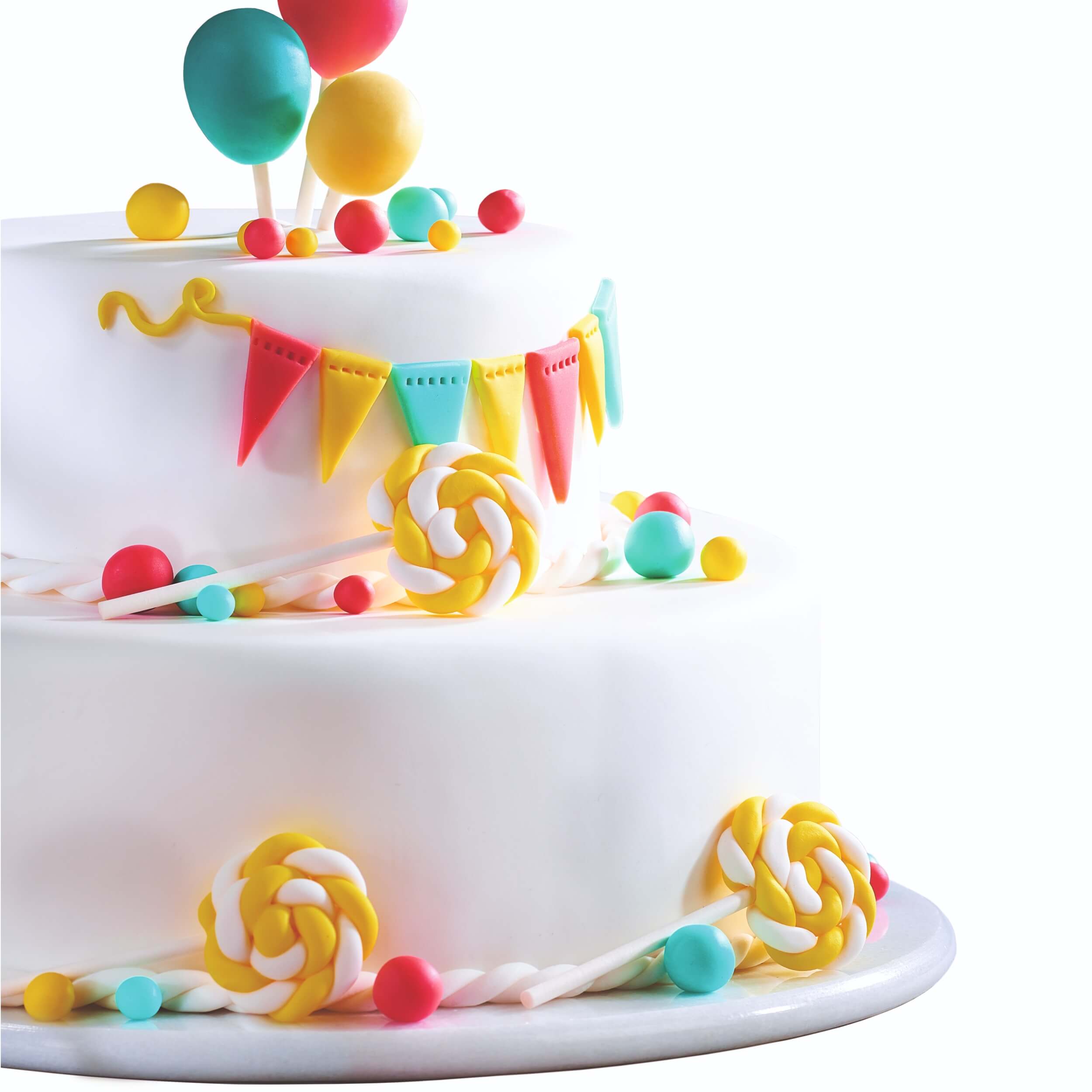 Weiße zweistöckige Torte mit bunten Fondant-Dekorationen wie Lollies, Girlanden, Kugeln und Cake-Pops